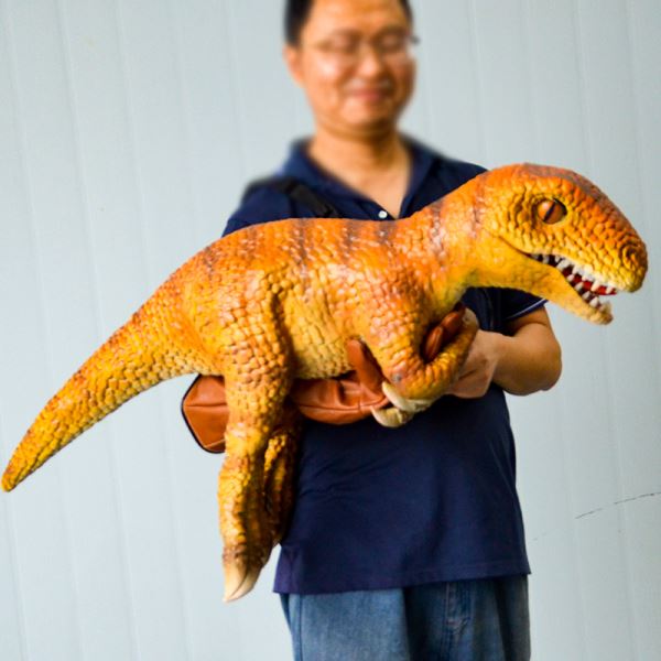 Propiedades de entretenimiento muñecos de mano Dinosaurio Velociraptor